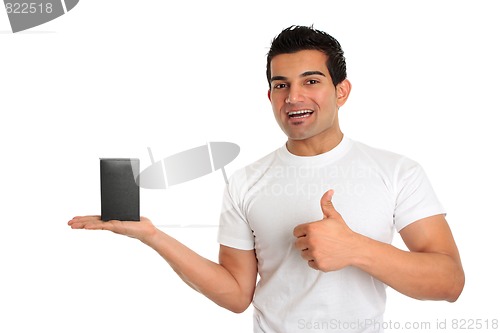 Image of Consumer or salesman with product thumbs up approval