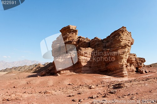 Image of Scenic weathered orange rock in stone desert