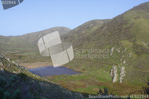 Image of Landscape with hills and a lake