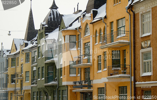 Image of Colorful houses in snowfall 