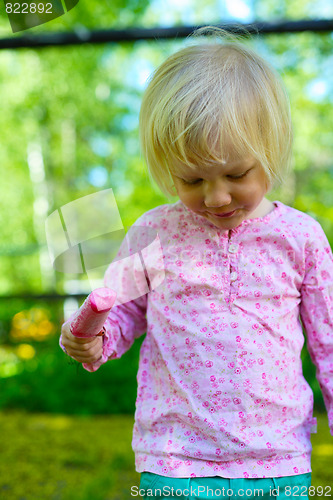 Image of Little girl with ice-cream