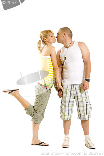 Image of Embracing glamorous couple