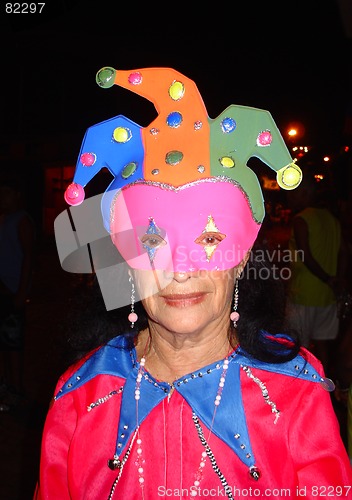 Image of elderly masked clown fantasy in carnival