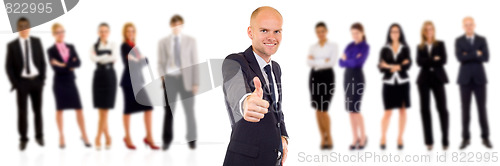 Image of successful business man with thumbs up 