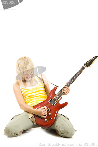 Image of girl playing an electric guitar