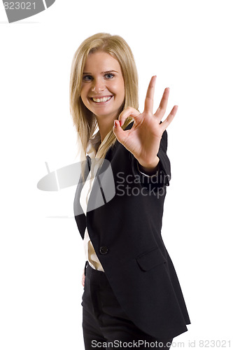 Image of Young businesswoman indicating ok sign