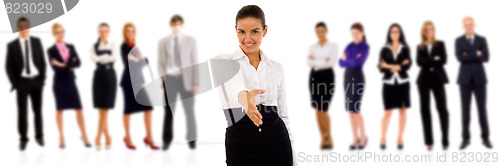 Image of businesswoman welcoming to her team
