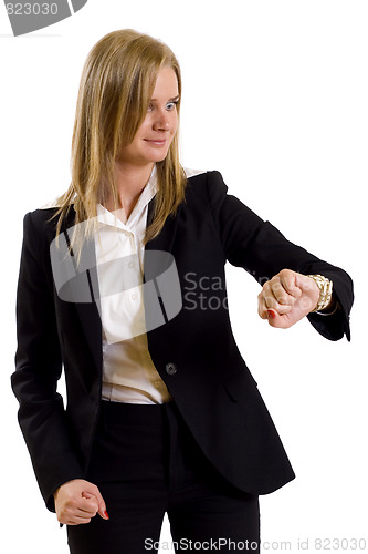 Image of  businesswoman checking time