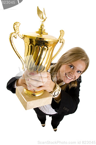 Image of  businesswoman winning a gold trophy