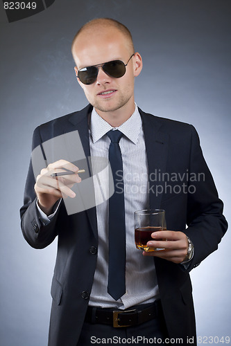 Image of smoking businessman