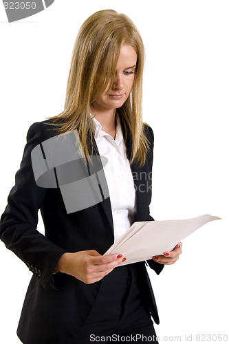 Image of Serious woman read document