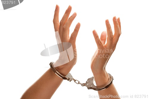 Image of Handcuffed Woman Raising Hands in Air on White