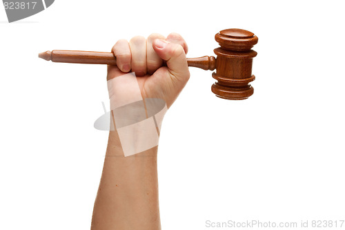 Image of Man Holding Wooden Gavel in Fist on White