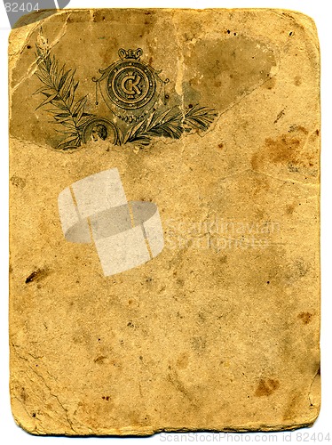 Image of Old textured paper with tattered edge. on white