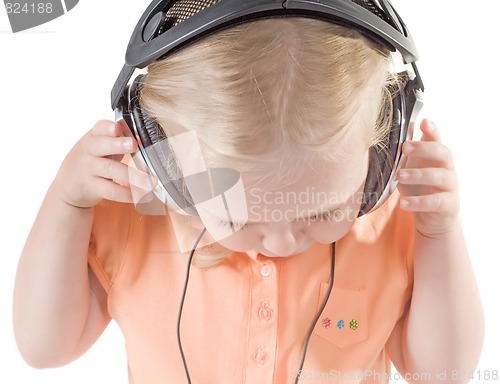 Image of Little girl with headphones
