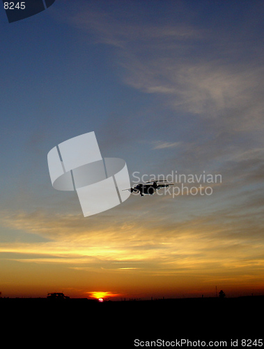 Image of Airplane In The Sunset