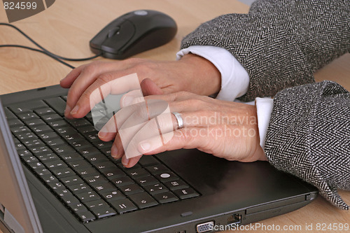 Image of Typing on a keyboard