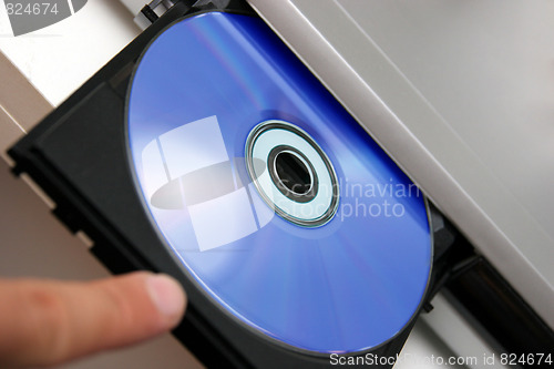 Image of insert CD on CD player