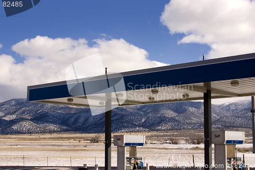 Image of Gas Station and Cloudy Skies