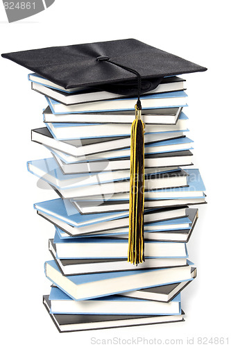 Image of graduation cap and books