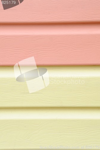 Image of yellow vinyl siding material for cladding