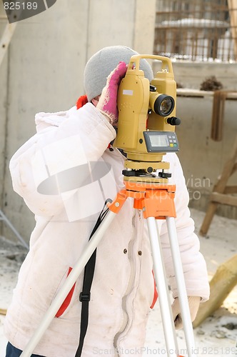 Image of surveyor worker at construction site