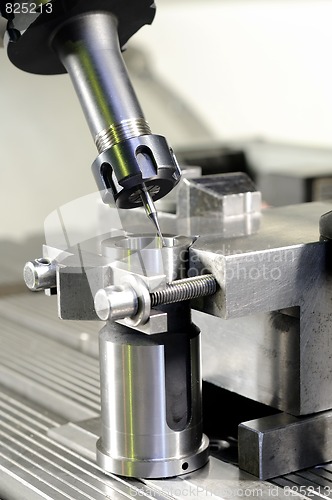 Image of milling the metal blank