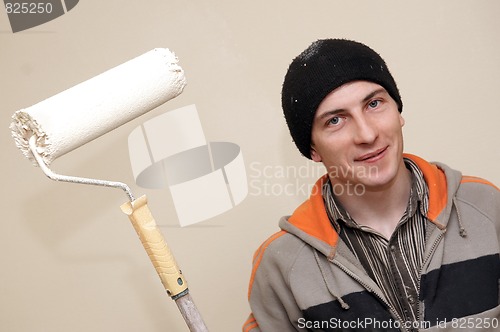 Image of Painter worker decorator with roller