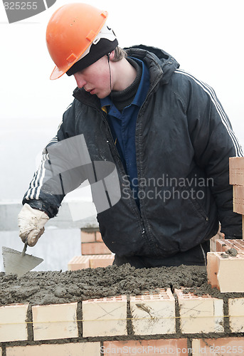Image of Brick layer worker builder mason