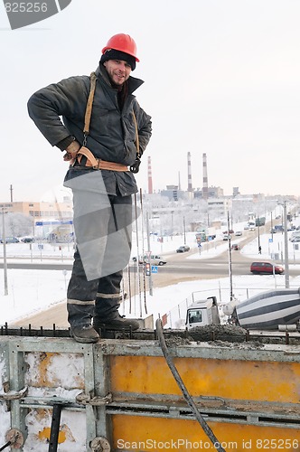 Image of worker builder at a construction site