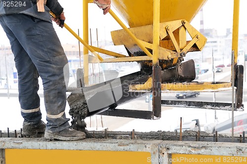 Image of construction worker at concrete work