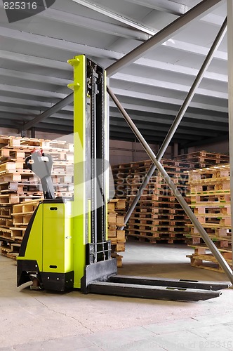 Image of forklifter stacker in warehouse