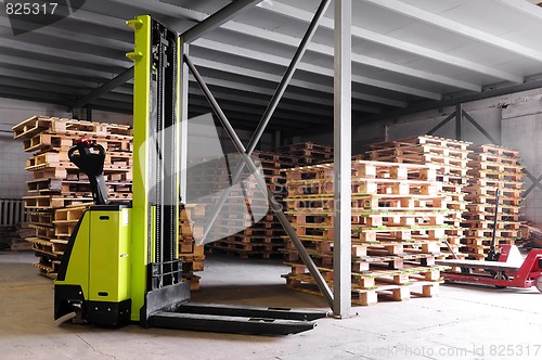 Image of forklifter stacker in warehouse