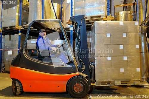 Image of forklift loader worker at warehouse