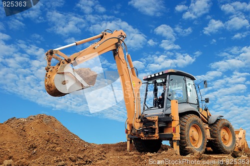 Image of Excavator Loader with rised backhoe