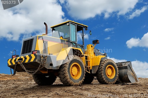 Image of rear view of diesel wheel loader bulldozer