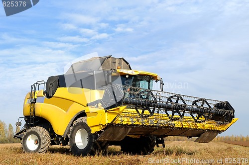 Image of combine  harvester in the field