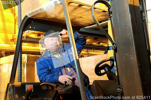 Image of forklift loader worker at warehouse