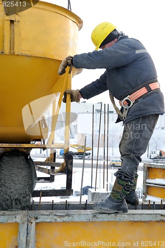 Image of construction worker at concrete work