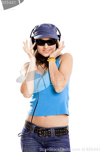 Image of Young girl listen music