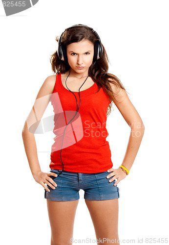 Image of Young girl listen music