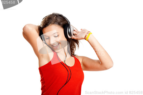 Image of Young girl listen music