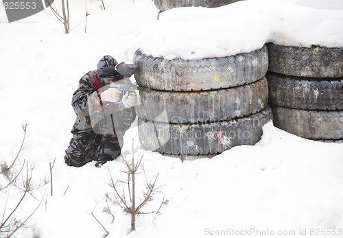 Image of Paintball player in an extreme game