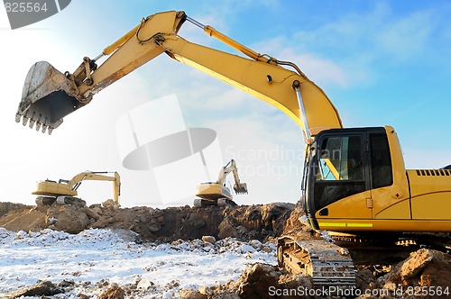 Image of loader excavator bulldozers at work