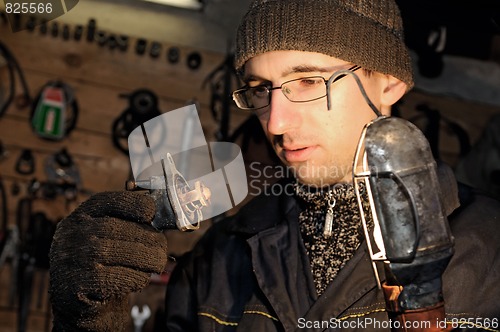 Image of car mechanic at repair work