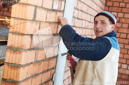 Image of construction mason worker bricklayer