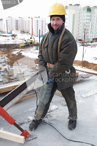 Image of worker builder and concrete formwork