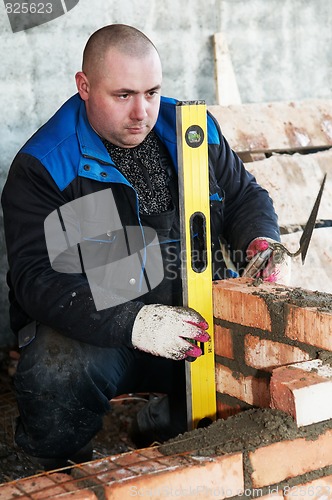 Image of construction mason worker bricklayer