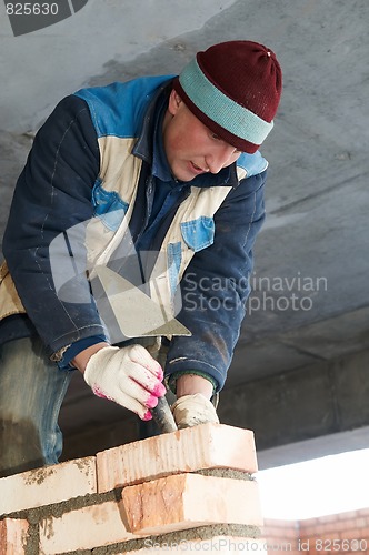 Image of construction mason worker bricklayer