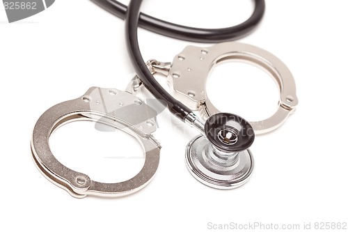 Image of Stethoscope and Handcuffs on White